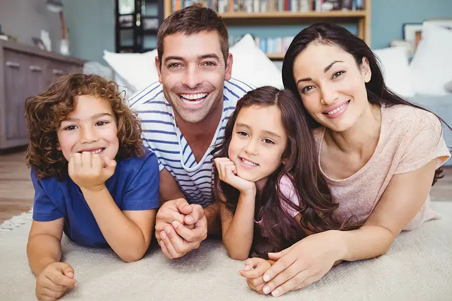 Family relaxing in a cool, comfortable home in Pinellas County